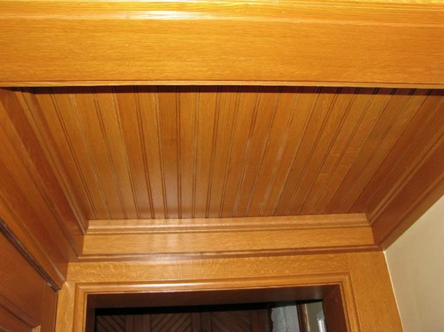 Custom milled quarter-sawn oak ceiling.