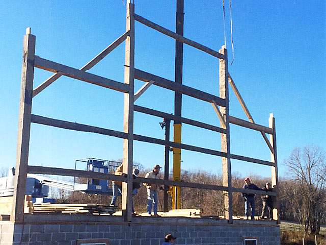 Setting the first truss on new barn