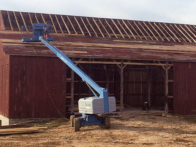 Adding roof planks to new barn