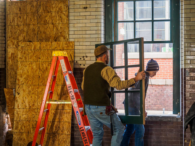 John and Jimmy Installing New Window