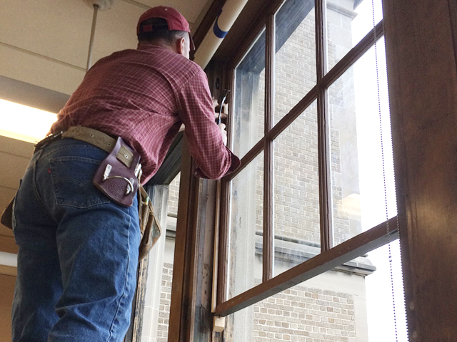 Wood Windows Being Installed