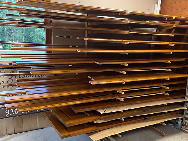 Stained door and trim work on the drying rack.