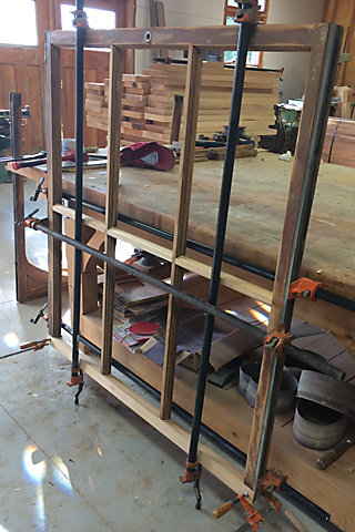 Restored window in clamps.