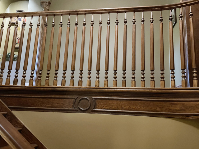 Finished hallway railing and trim work restored and installed.